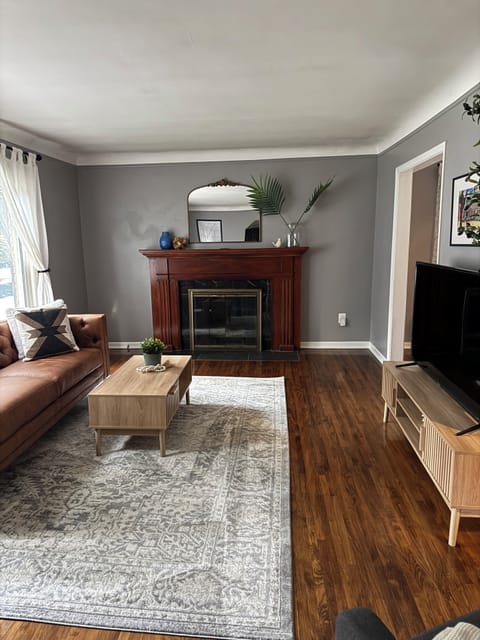 Living Room with Couch, Chair, and Roku Smart TV