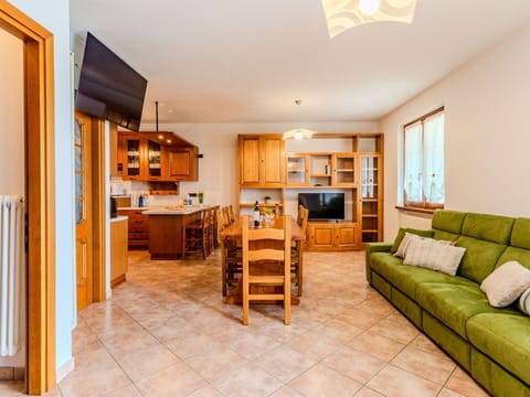 Furniture, Interior Design, Wood, Flooring, Ceiling, Floor, Room, Couch, Living Room, Cabinetry