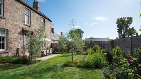 Cambridge House - the enclosed garden benefits from a lawned area and patio