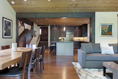 Curl up with a glass of wine by the fireplace in the inviting living room