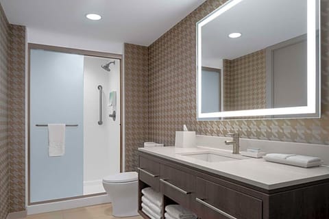 Start your day refreshed with a bright, modern bath setup.