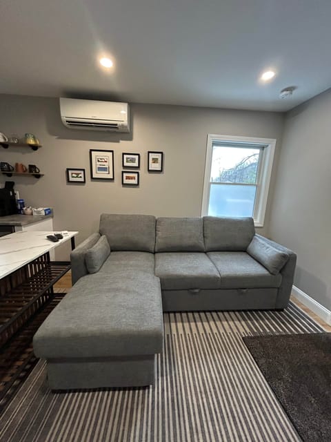 Enter into the living space with a pull out sleeper sofa and 50" TV. New couch as of 12.2025!