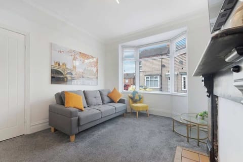 Unwind in our open-plan living and dining area, complete with a Smart TV and a plush sofa for ultimate comfort.