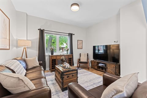 Relax on the couch, watch TV, play PS5, or enjoy board games.