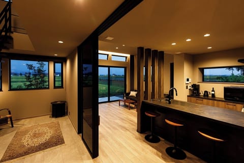 View of the hall, kitchen and living room