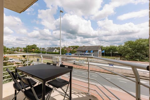 Sunny terrace with view to the main road