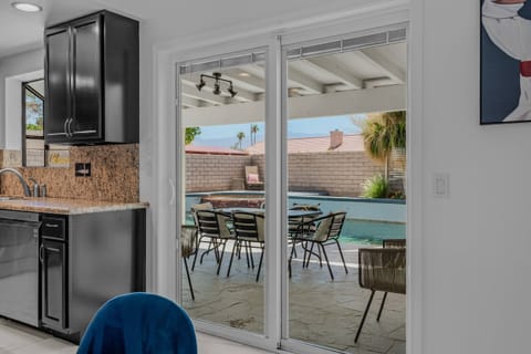 Sliding doors leading to outside entertainment area