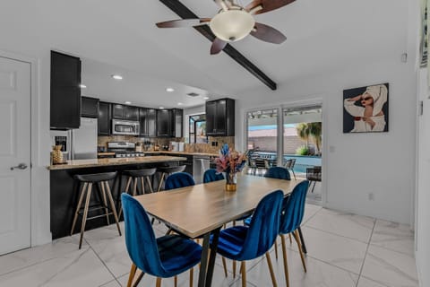 Modern open plan kitchen with dining room adjacent