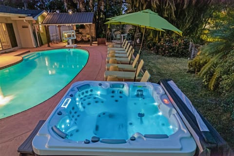 The perfect escape! Enjoy the best of both worlds—hot tub warmth & poolside fun!