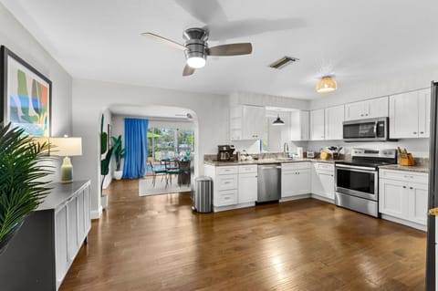 Features ample cabinetry and high-end appliances for a seamless cooking experience.
