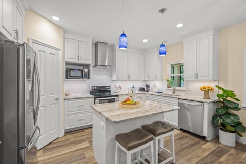 Cook your best meals in this upgraded kitchen with modern touches. Plenty of storage in the walk in pantry!
