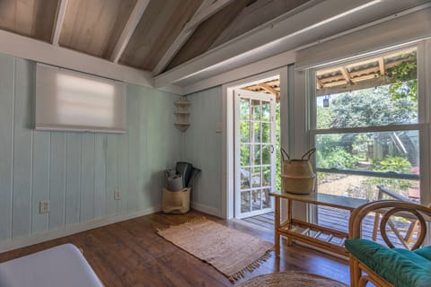 just beyond the patio is this cozy, peaceful garden house—a quiet spot to read, stretch, or simply unwind