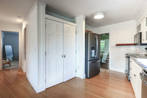 kitchen flows right into the sunroom
