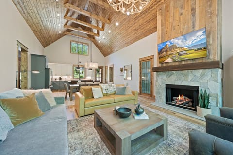 Vaulted Exposed Beam Ceiling, Gas Fireplace and TV