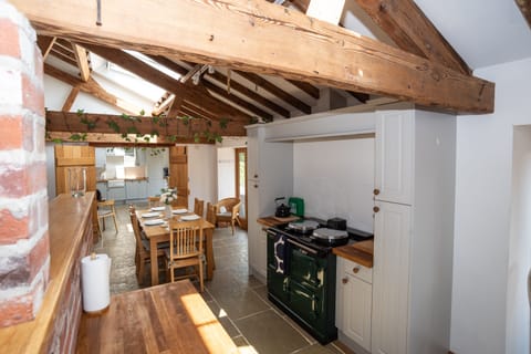 Full AGA cooker ready for easy home-cooked meals — a cosy alternative to Hereford’s nearby restaurants