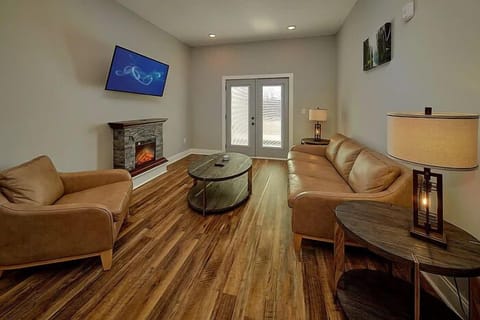 Spacious Living Room with Electric Fireplace and SMART TV with Cable & WIFI throughout vacation rental