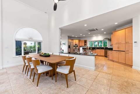 Enjoy meals together in this open dining area right next to the kitchen.