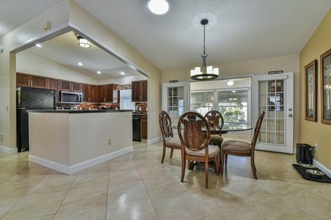 Designer custom-built gourmet kitchen,  open floor plan with dining room