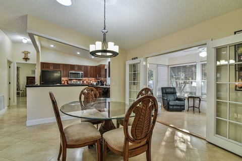 Formal dining room and Florida room with twin bed.