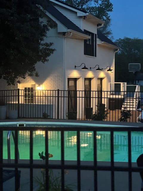 Carriage House.  Entrance to unit is to the far right with stairs. 
