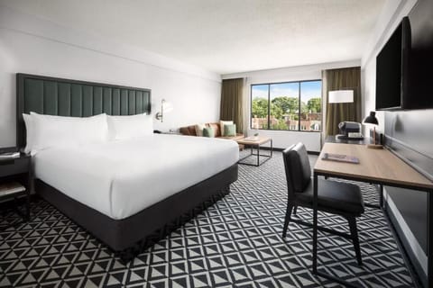 Wake up to sunshine and stretch out in crisp bedding.