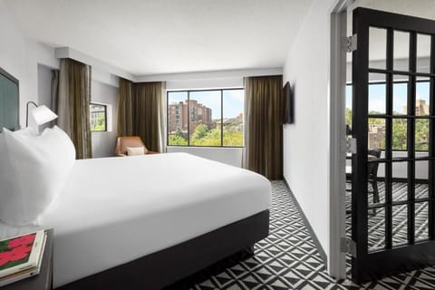 Sink into crisp bedding and wake up to sunlit views.