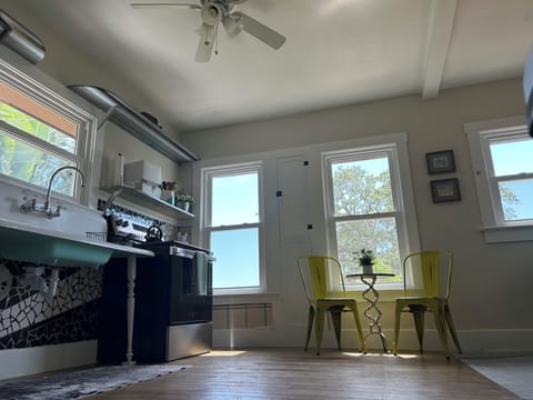 Full vintage kitchen with water views and updated appliances.