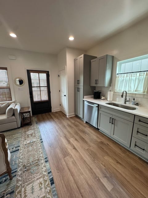 All front doors and windows have wooden blinds for privacy.