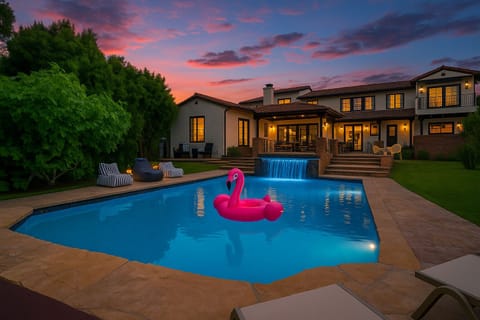 Enjoy poolside paradise with floaty toys, ensuring endless fun under the San Diego sun at Modern Mediterranean