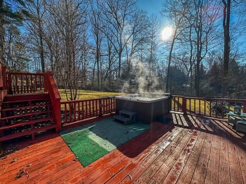 Soak up the sun and the serenity—this hot tub by the deck is the ultimate daytime retreat.