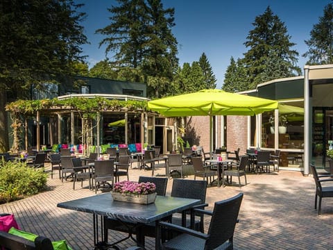 Sip, snack, and socialize on the sunlit garden terrace.