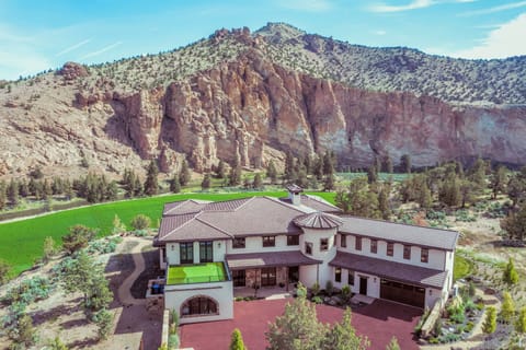 Aerial view of the  estate nestled among rugged canyon walls—offering unmatched privacy and connection to the high desert landscape
