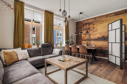 Enjoy a combined space for meals and relaxation, filled with sunlight.