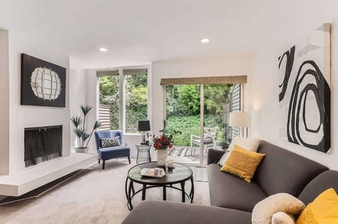 Relax in a stylish living room with a clean, modern aesthetic—comfortable and inviting for work or leisure.
