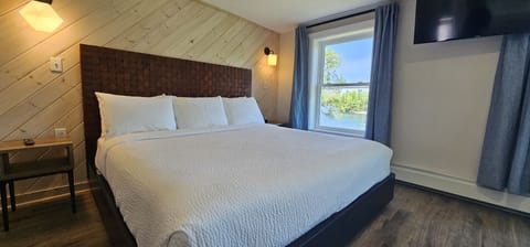 Spacious king bed for a restful and relaxing night