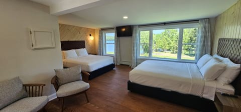 Spacious Double Queen Room—perfect for families or friends traveling together.