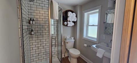 Private bathroom with fresh linens and thoughtful touches.