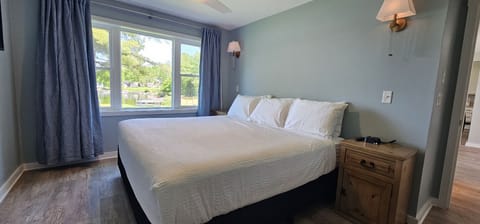 Sleep like royalty with lake air and a king-size bed.