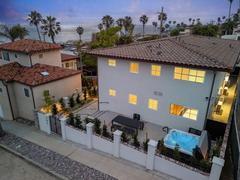 This La Jolla gem at Rosemont Street features a clean, modern façade accented by lush landscaping and coastal-inspired architecture.