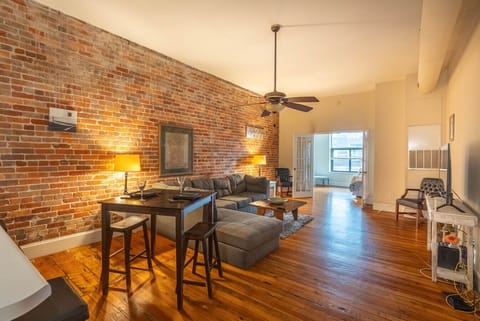 Family Room, beautiful original brick walls!