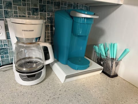 We provide a Keurig and regular coffee maker. Please bring your own beans.