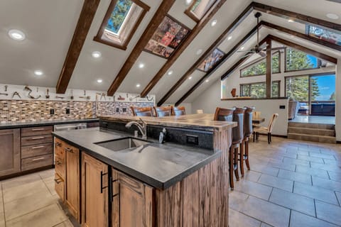 Kitchen: Second floor, drip coffee maker & keurig, toaster, waffle maker, Crockpot, cooking utensils, tableware

