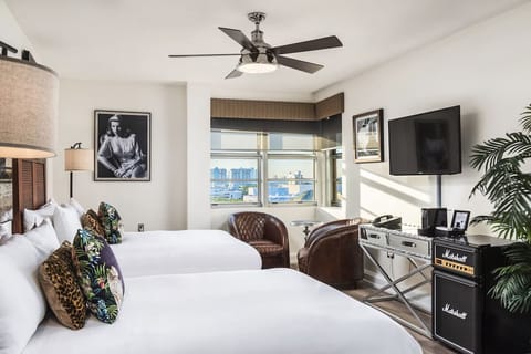 Linger in morning light beside panoramic corner windows.