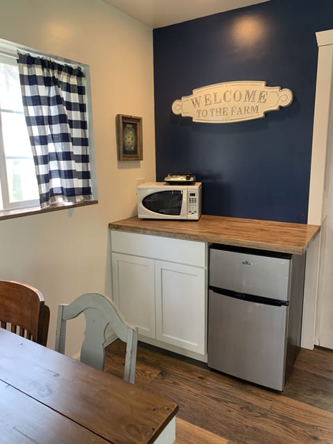 Small fridge, microwave, hot plate and utensil drawer