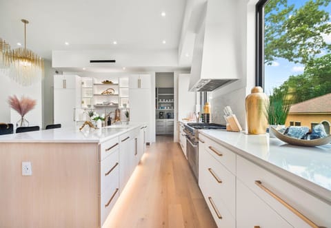 The oversized island is perfect for gathering, grazing, or simply sipping wine and swapping stories.