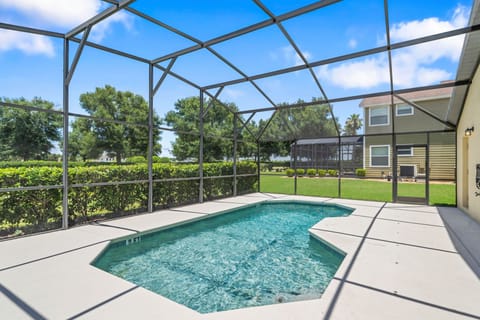 A private screened pool offering a refreshing place for guests to relax between theme-park visits.