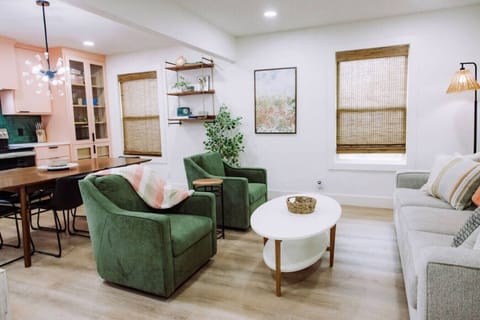 {Living Room} Open-concept living area w/ sleeper couch (Queen bed) and smart TV