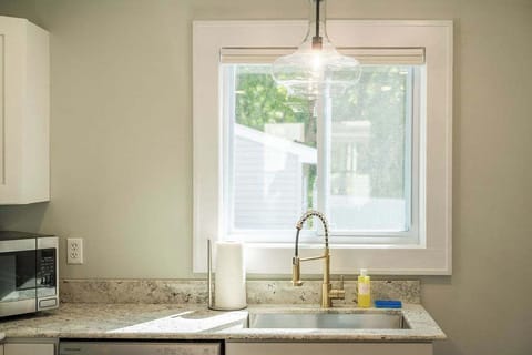 A light-filled kitchen with everything you need to cook, snack, or sip your morning coffee.