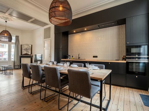 Furniture, Interior Design, Flooring, Wood, Floor, Chair, Light Fixture, Ceiling, Table, Kitchen & Dining Room Table