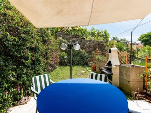 Furniture, Outdoor Furniture, Shade, Chair, Garden, Outdoor Table, Backyard, Umbrella, Landscaping, Yard